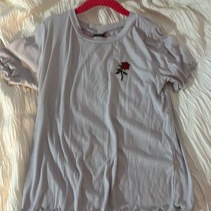 A cute top with a little rose!